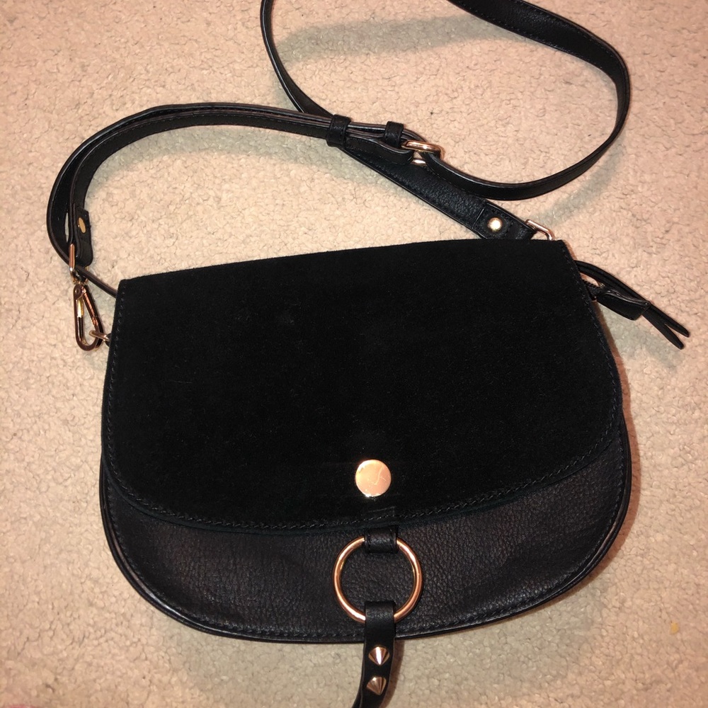 Moda Luxe black suede purse. Never worn!!